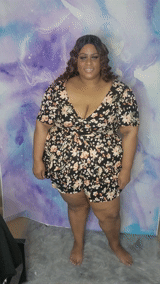 Review of product Plus Size Darcie Ruffle Floral Print Romper in Black